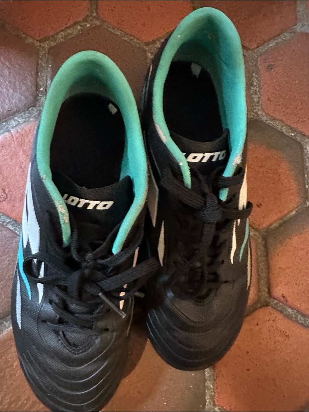 LOTTO Black and Teal Kids Soccer cleats